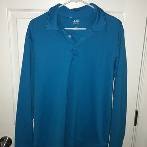 Blue long sleeved golf shirt